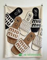 Miumiu Throw Blankets